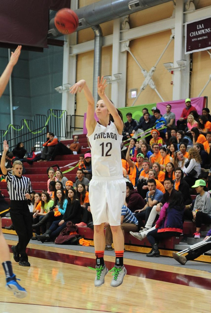Fourth-year forward Ellie Greiner shoots a three pointer against the University of Rochester at Neon Night earlier this year.