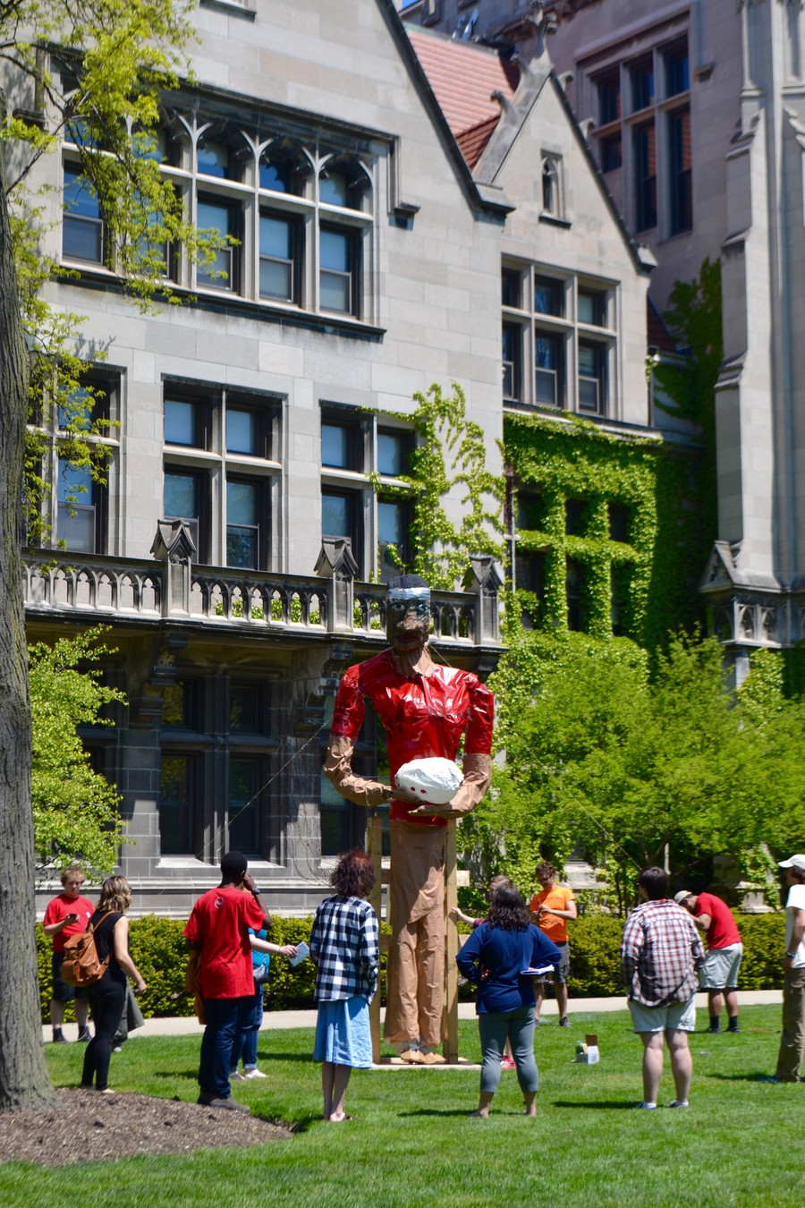 Students erect a tall construction of the “Muffler Man” on the Quad, one of hundreds of items on the 2017 Scav list.