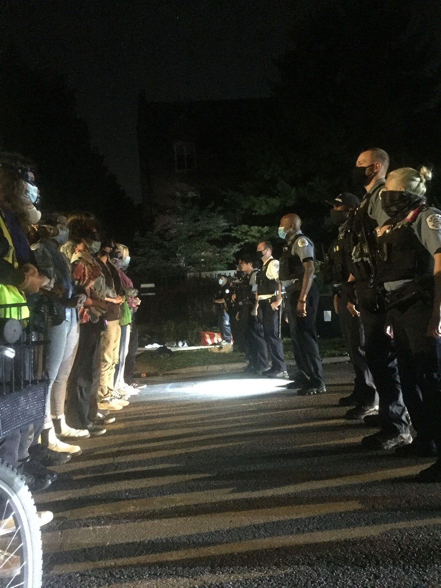 Protestors and police stand off on the evening of Friday, September 4th, 2020, as a weeklong occupation of the street near Provost Ka Yee Lee's home concludes.