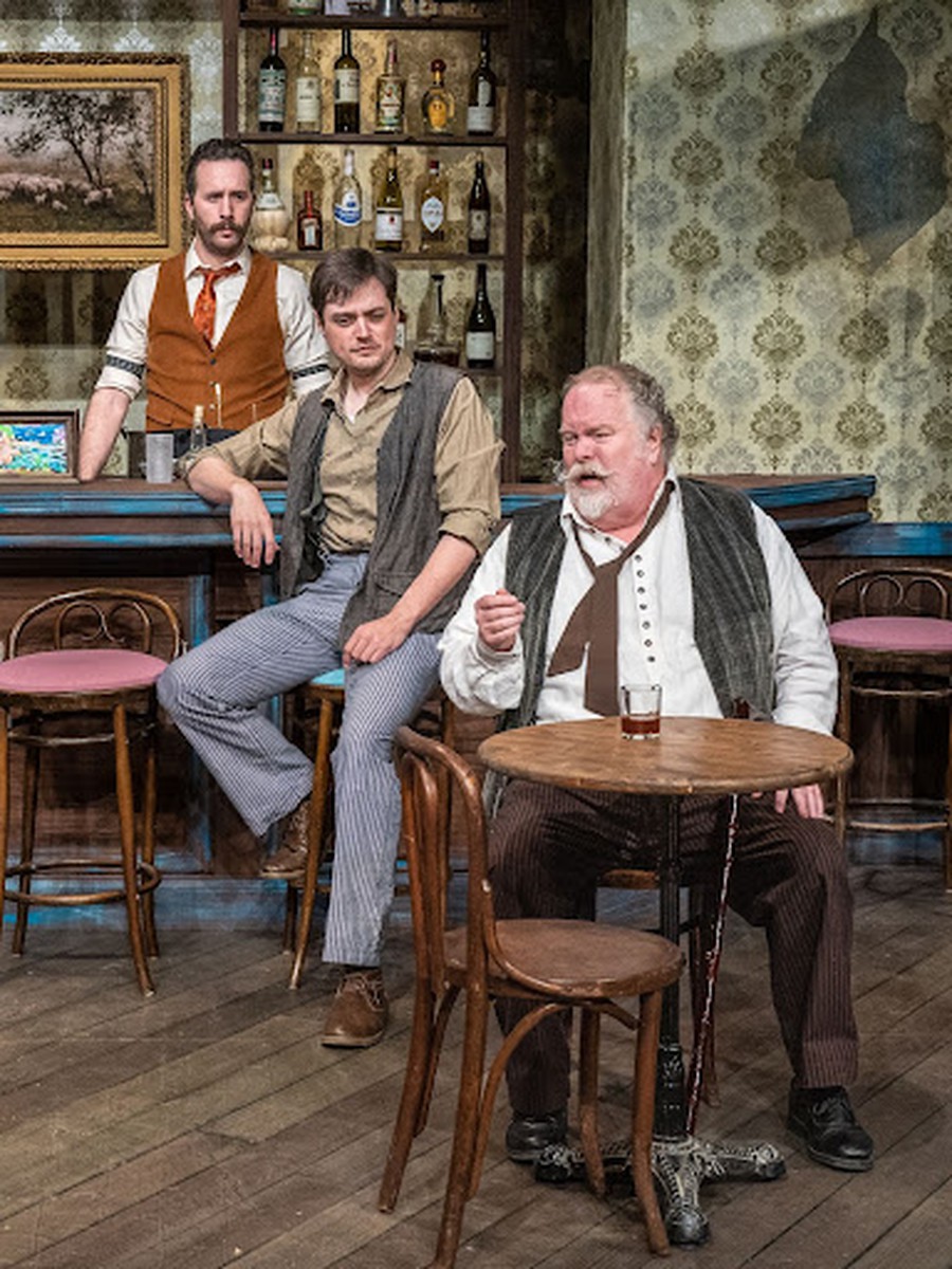 (From left to right) Philip C. Matthews as Freddy, Travis Ascione as Picasso, and Dan Deuel as Gaston in "Picasso at the Lapin Agile."